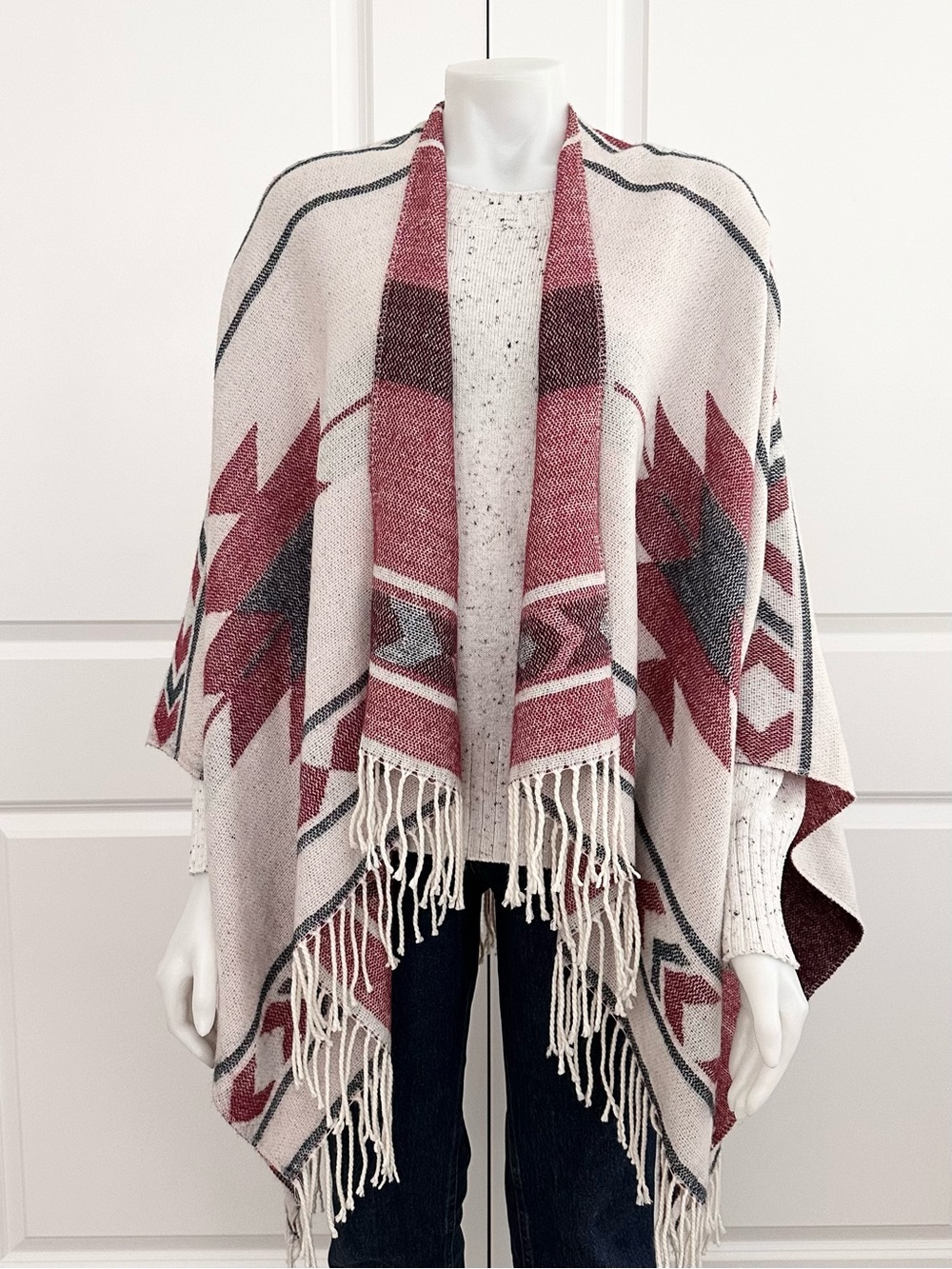 Reversible Southwestern Print Tassel Trim Sweater Poncho in Cream and Burgundy